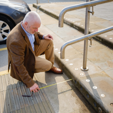 Man measuring steps